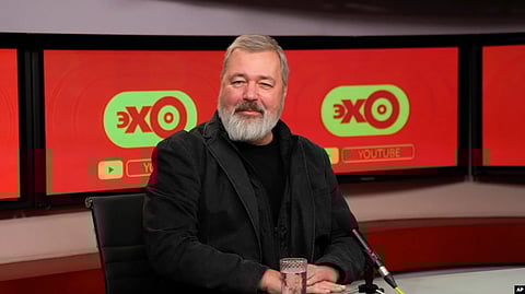 Novaya Gazeta editor Dmitry Muratov at the Ekho Moskvy (Echo of Moscow) radio station live broadcast in Moscow, Russia, Oct. 8, 2021. He plans to auction off his medal to raise funds for children displaced by the invasion of Russian forces.