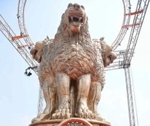 The 6.5-meter tall fully hand-crafted National Emblem of India on the roof of the new Parliament building. (IANS)
