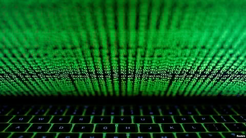 A computer keyboard lit by a displayed cyber code is seen in this illustration picture taken on March 1, 2017.