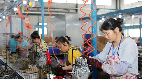 China's Factory Activity Contracts Unexpectedly in July as COVID Flares Up