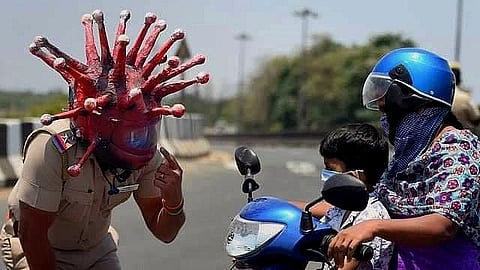 A cop raising awareness about Covid-19 pandemic in a creative way.