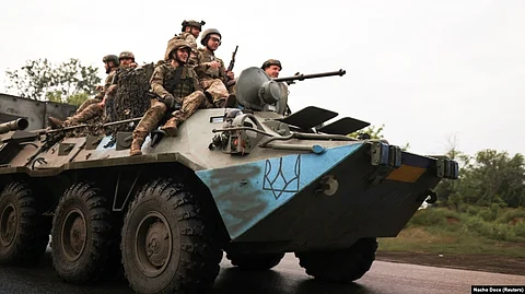 Russia-Ukraine War: Ukrainian servicemen travel on a wheeled BTR fighting vehicle near Bakhmut.