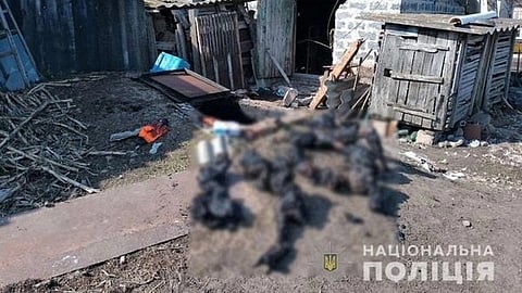 Husarivka village (Izium Raion in Kharkiv Oblast of Ukraine) after Russian occupation during the 2022 Russian invasion of Ukraine. On April 4, the village was liberated, and Ukrainian police began documenting the war crimes of Russian troops. In the basement of one of the private households, 3 mutilated bodies were found, including 1 child. According to the police, people were burned alive.