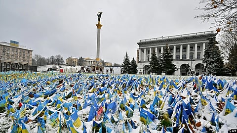 Ukraine: This Nov. 17, 2022, photo shows Ukrainian flags set at Independence Square in Kyiv, symbolizing the deaths of Ukrainian soldiers in the conflict, covered with snow after the first snowfalls of the season.
