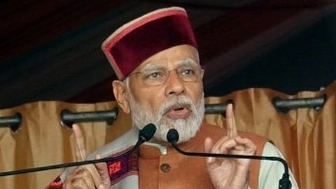 Modi in Vizag: BJP workers and supporters lined up on either side of the road from INS Dega to Naval Dockyard to welcome the Prime Minister Modi.