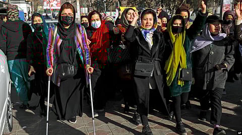 Afghan women chant slogans during a protest against the ban on university education for women, in Kabul, Afghanistan, Dec. 22, 2022. (AP)