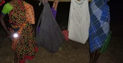 Braving wild animals and hostile weather, pregnant woman carried for 3 km (IANS)