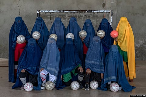 An Afghan women's soccer team poses for a portrait in Kabul. (AP)