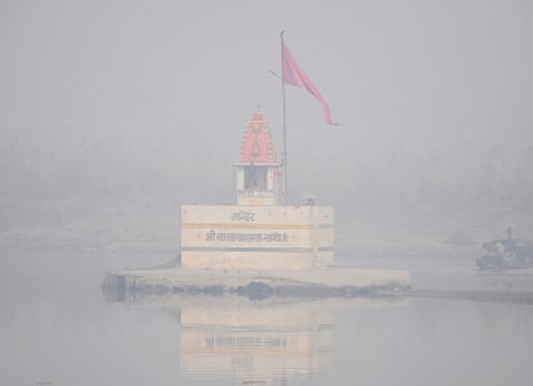 New Delhi: A temple seen hazy as a thick layer of fog engulfs around the area on a cold day, in New Delhi on Monday, Jan. 09, 2023. (Photo: Qamar Sibtain/IANS)