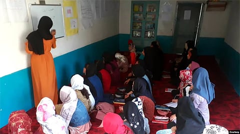 In SRAK’s underground school in Kabul, volunteers teach Afghan girls English, math, sciences and other subjects. (Photo courtesy SRAK) 