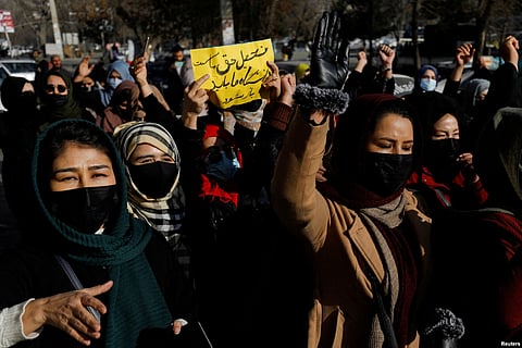 Afghan women protested against the closure of universities to women by the Taliban in Kabul on December 22. (Reuters)