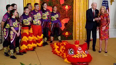President Joe Biden and first lady Jill Biden speak during a reception to celebrate the Lunar New Year in the East Room of the White House in Washington, Jan. 26, 2023. (AP)