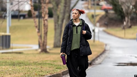 FILE - Kailani Taylor-Cribb walks through her neighborhood in Asheville, N.C., Jan. 31, 2023. Kailani hasn’t taken a single class in what used to be her high school since the height of the coronavirus pandemic. (AP)