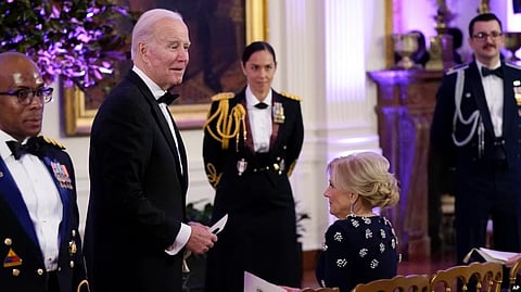 President Joe Biden and first lady Jill Biden arrive in the East Room of the White House following a dinner reception for the governors and their spouses, in Washington, Feb. 11, 2023. (AP)