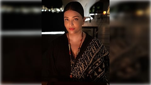 Abhishek took to Instagram, where he shared a string of photos from his 47th birthday trip including his "beautiful view" of Aishwarya. (IANS)