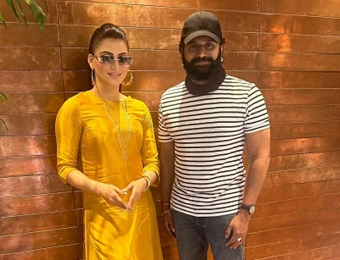 Urvashi took to Instagram, where she shared a picture posing with Rishab, who also directed the film. (IANS)