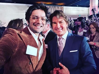 Ali Fazal clicks pics with Tom Cruise at Oscar luncheon. (IANS)