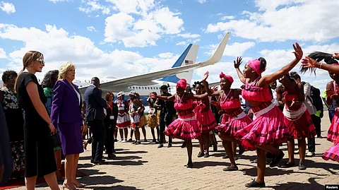 First lady Jill Biden watches a dance performance as she arrives during the first leg of her African visit, at the Hosea Kutako International Airport in Windhoek, in Namibia, Feb. 22, 2023. (Reuters)