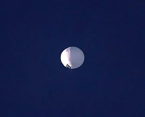 A high altitude balloon floats over Billings, Montana, on Wednesday, Feb. 1, 2023. (Larry Mayer/The Billings Gazette via AP)