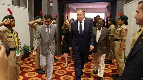 Russian Foreign Minister Sergey Lavrov, center, arrives to attend the opening ceremony of exhibition ''Leo Tolstoy – Mahatma Gandhi'' on the sideline of G20 foreign minister's meeting in New Delhi, India, March 1, 2023.