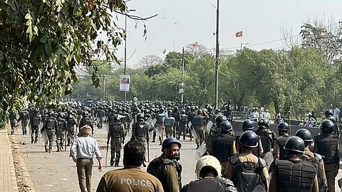 PTI posted a footage showing armed law enforcement personnel opening fire.
