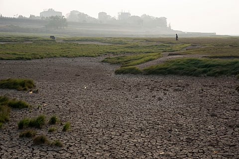 The cracked bed of the Poyang Lake is exposed during drought season in north-central China’s Jiangxi province, Nov. 1, 2022. (AP)