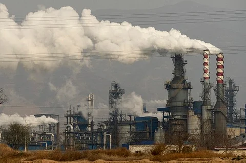 Smoke and steam rise from a coal processing plant in Hejin in central China’s Shanxi Province on Nov. 28, 2019. (RFA)