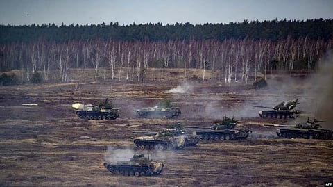 This handout video grab released by the Russian Defense Ministry on Feb. 21, 2022, shows Russian and Belarus tanks during joint exercises near Brest, Belarus. (AFP)
