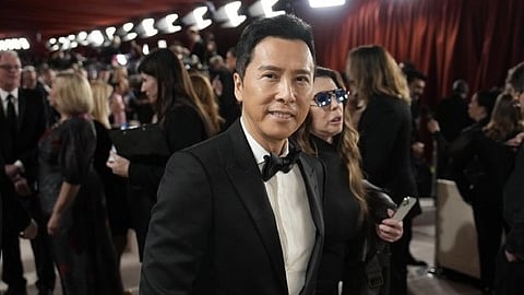 Donnie Yen arrives at the Oscars on March 12, 2023, at the Dolby Theatre in Los Angeles.