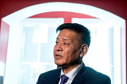 Dalai Lama sticks out boy's tongue and says “and suck my tongue.” (RFA)