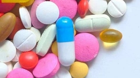 Several different kinds of pills in a pile