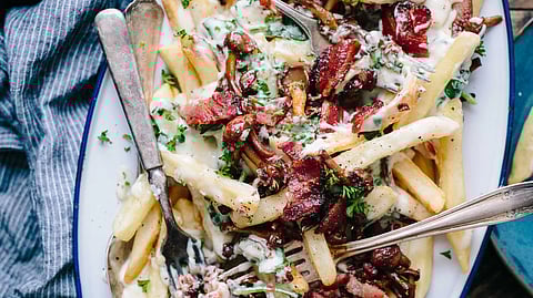 A tasty, flavorful, crisp, and spicy appetiser that is simple to prepare is reported to be potato wedges. It is one of the best late-night treats and can be deep-fried or baked. (Unsplash)