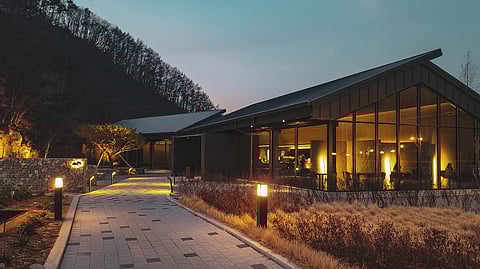 Sustainable boutique retreat Nirjhara, in Tabanan on Bali’s southwest coast is artfully designed around the spectacular cascading waterfall after which it is named. (Unsplash)