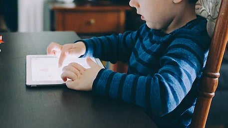 The app delivers scores that evaluate the quality of the data analysed, the confidence of its results and the probability that the child tested. (Unsplash)