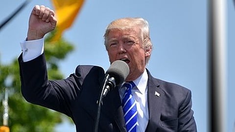 Donald Trump speaks as the US launches airstrikes on Iran following a cargo ship attack in the Strait of Hormuz