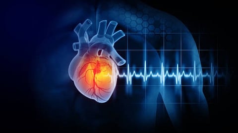 Digital illustration of a glowing human heart with an ECG line.