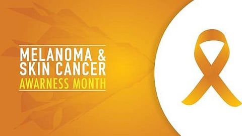 Melanoma and Skin Cancer Awareness Month banner with orange ribbon.”