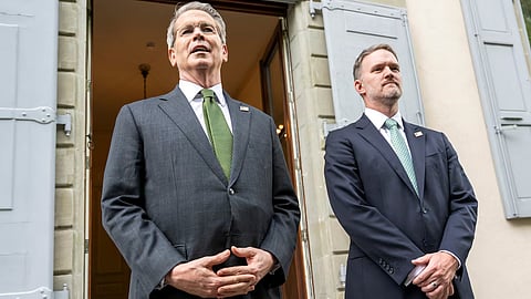 two images of men in suits, both appearing professional and engaged in conversation.