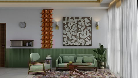 A cozy living room with green walls and a green couch, offering a fresh and inviting ambiance.