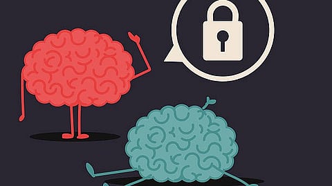 The image shows a computer screen featuring two brains, symbolizing a discussion on mental processes or brain function