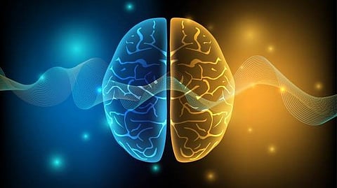 A glowing digital illustration of two brains in blue and orange connected by swirling light.