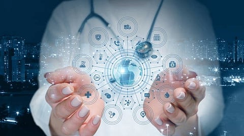 Hands holding digital icons around a globe, symbolizing global healthcare technology.