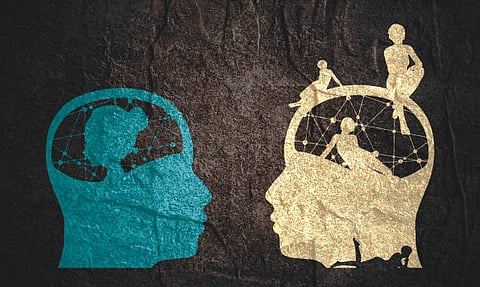 Abstract digital painting of two human heads with connrcted network patterns inside.