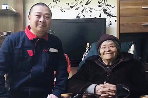 Chinese dissident Chen Yunfei, left, and his mother are shown in an undated photo. (File Photo)