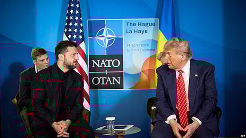 In this handout photograph taken and released by the Ukrainian Presidential Press Service on June 25, 2025, Ukraine's President Volodymyr Zelensky (L) meets with US President Donald Trump on the sideline of the North Atlantic Treaty Organization (NATO) summit in The Hague.