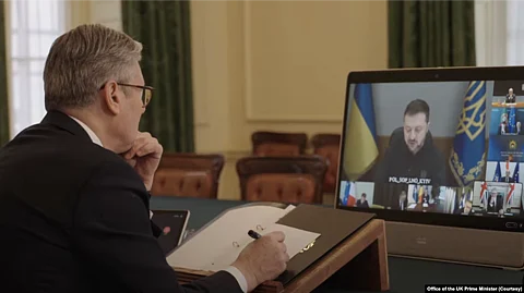 In this photo taken from video on March 15, 2025, British Prime Minister Keir Starmer participates from London in a virtual meeting with a group of European, Australian, New Zealand and Canadian leaders. They discussed the proposed ceasefire between Russia and Ukraine.