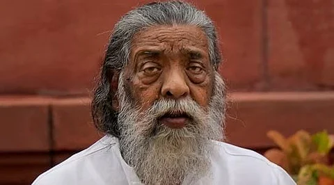 In the image the former CM of jharkhand Shibu Soren is present