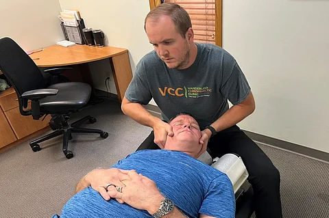 John-Paul Sager, a veteran of the Marine Corps and Army, is treated for chronic back and shoulder pain