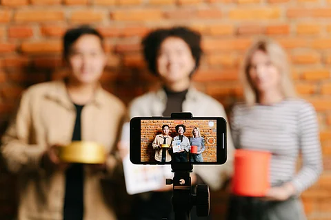In the image influencers are shown advertising for something