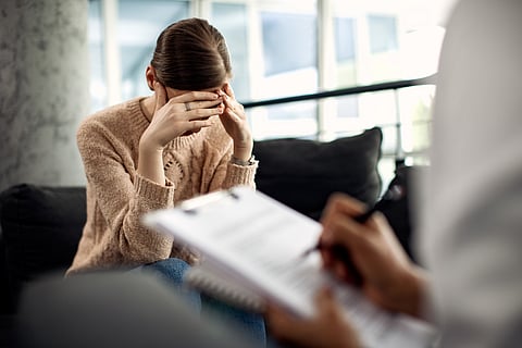 A woman going through her psychological treatment session.